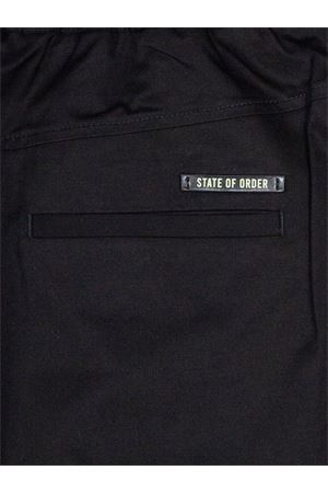 Pantalone cargo in cotone nero STATE OF ORDER | SP26019D001